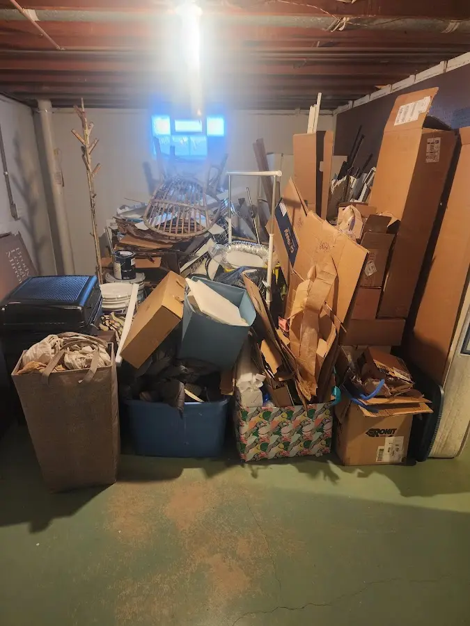 Roll-off dumpster container at job site for 6 Yard Dumpster Rental in Camden